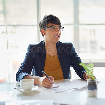 Buy stock photo Shot of a corporate businesswoman sitting in the boardroom