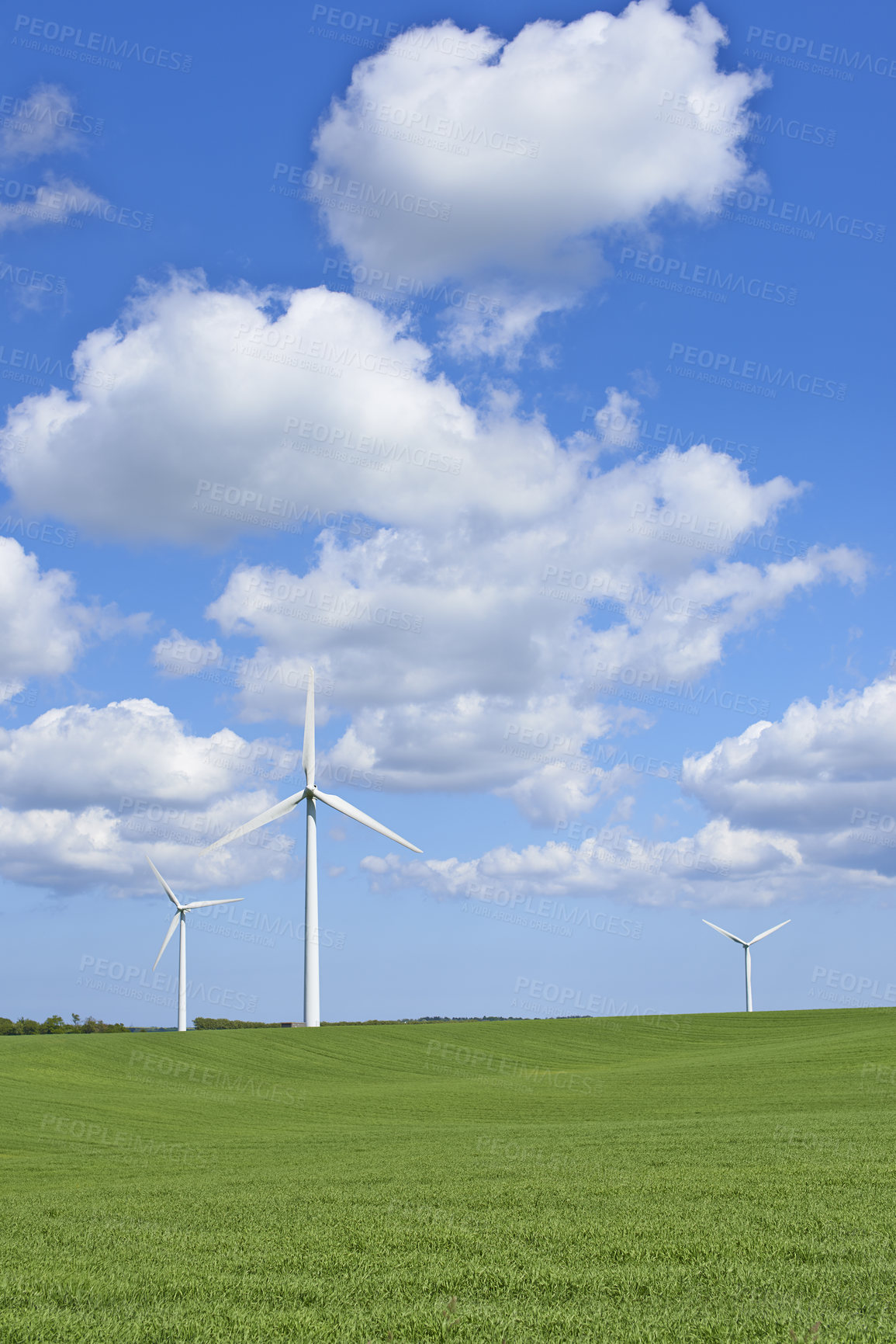 Buy stock photo Windmill, field and outdoor for renewable energy, sky or clouds with infrastructure to fight climate change. Wind farm, horizon and environment with eco friendly production for electricity in Denmark