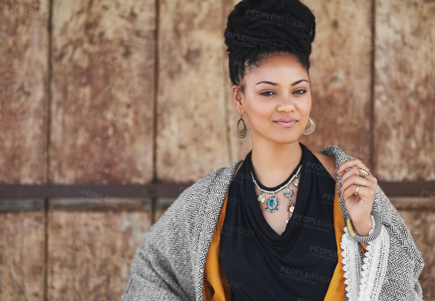 Buy stock photo Cropped shot of an attractive young woman posing outdoors