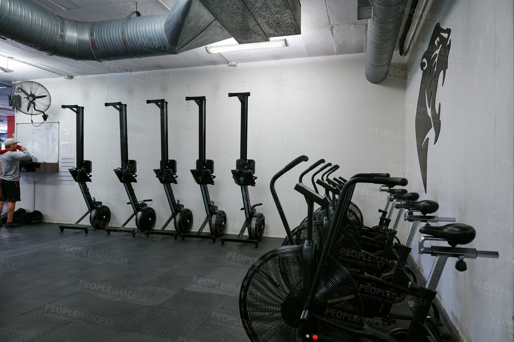 Buy stock photo Cropped shot of the inside of an empty gym in black and white