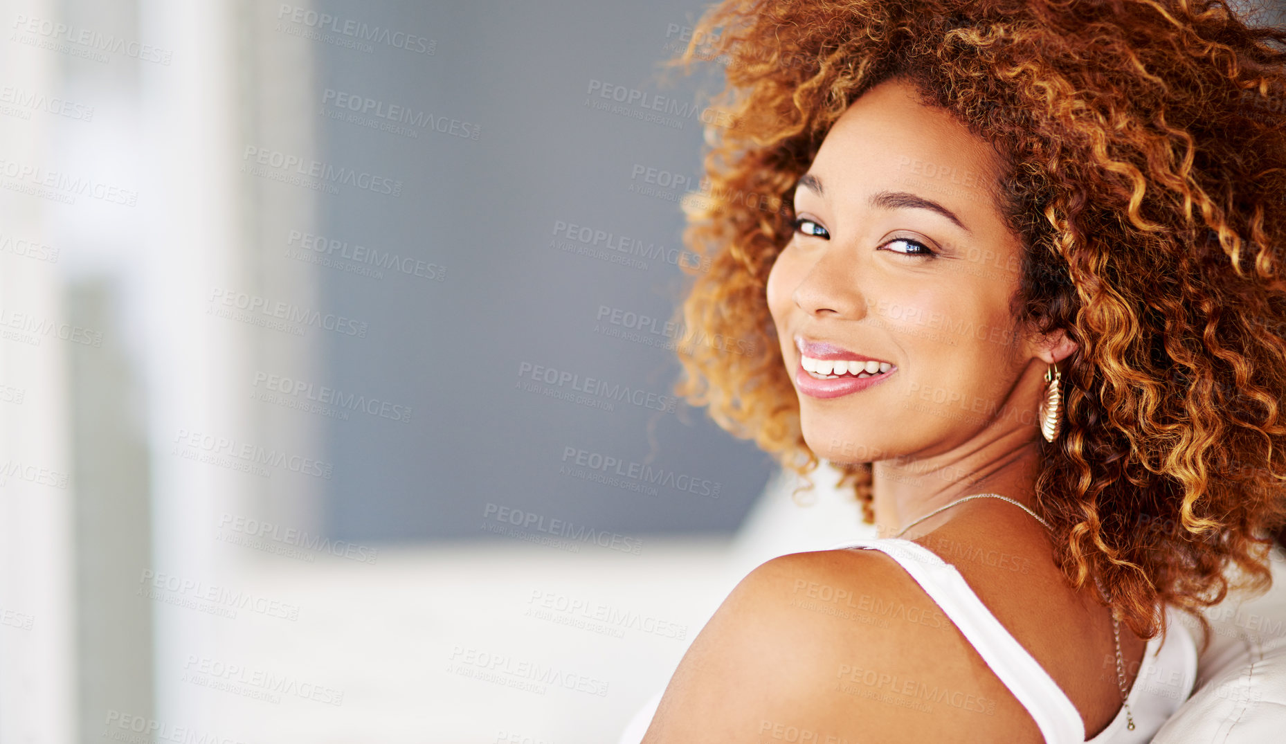 Buy stock photo Portrait, smile and woman relax in home living room on sofa for peace, calm or alone on weekend. Face, happy and African girl on couch in lounge for comfort, rest or leisure in apartment in Mauritius