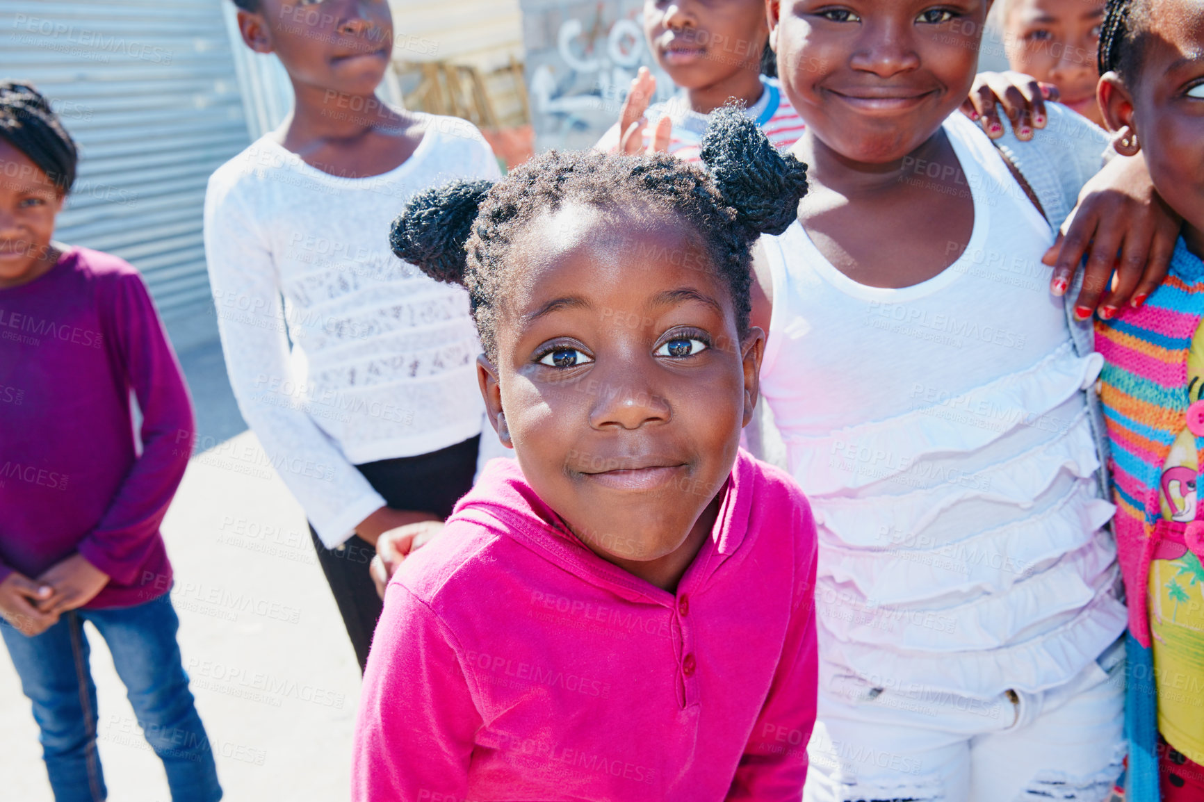 Buy stock photo Cropped portrait of a group of kids at a community outreach event