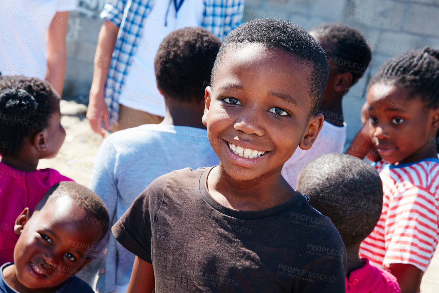 Buy stock photo Cropped portrait of a young child at a community outreach event