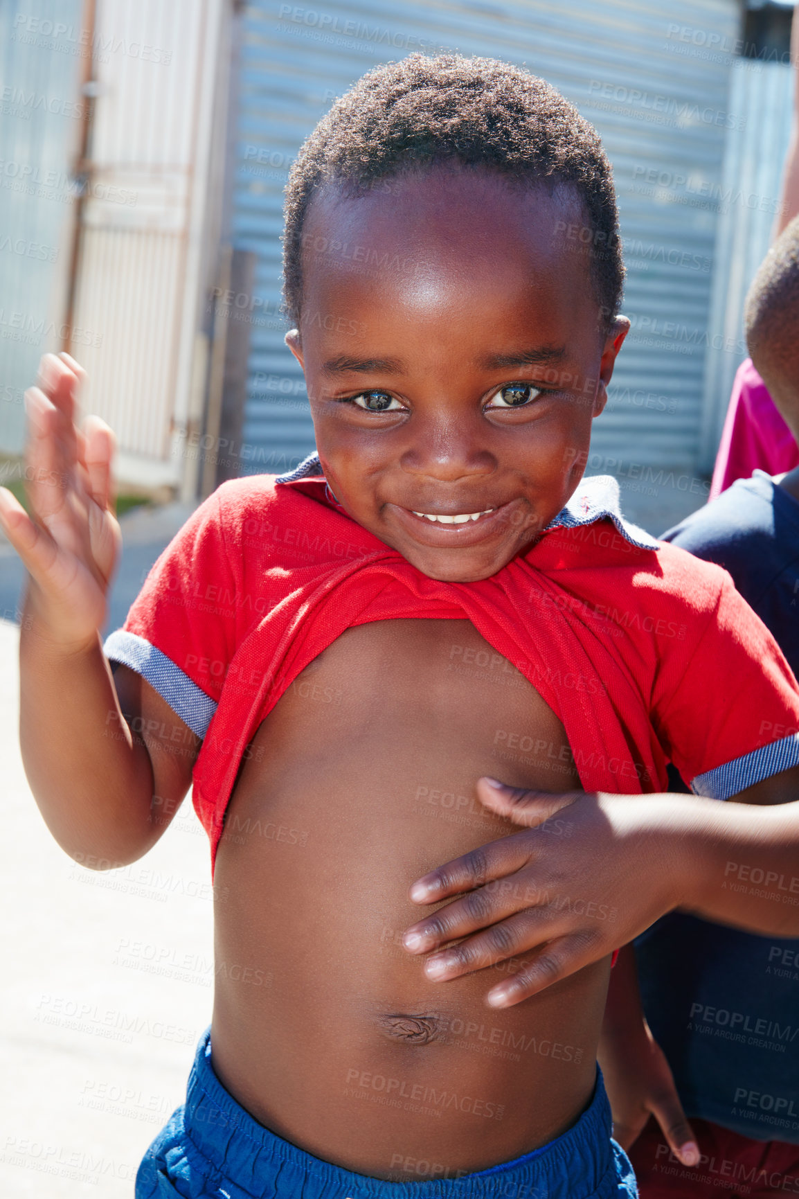 Buy stock photo Cropped portrait of a young child at a community outreach event