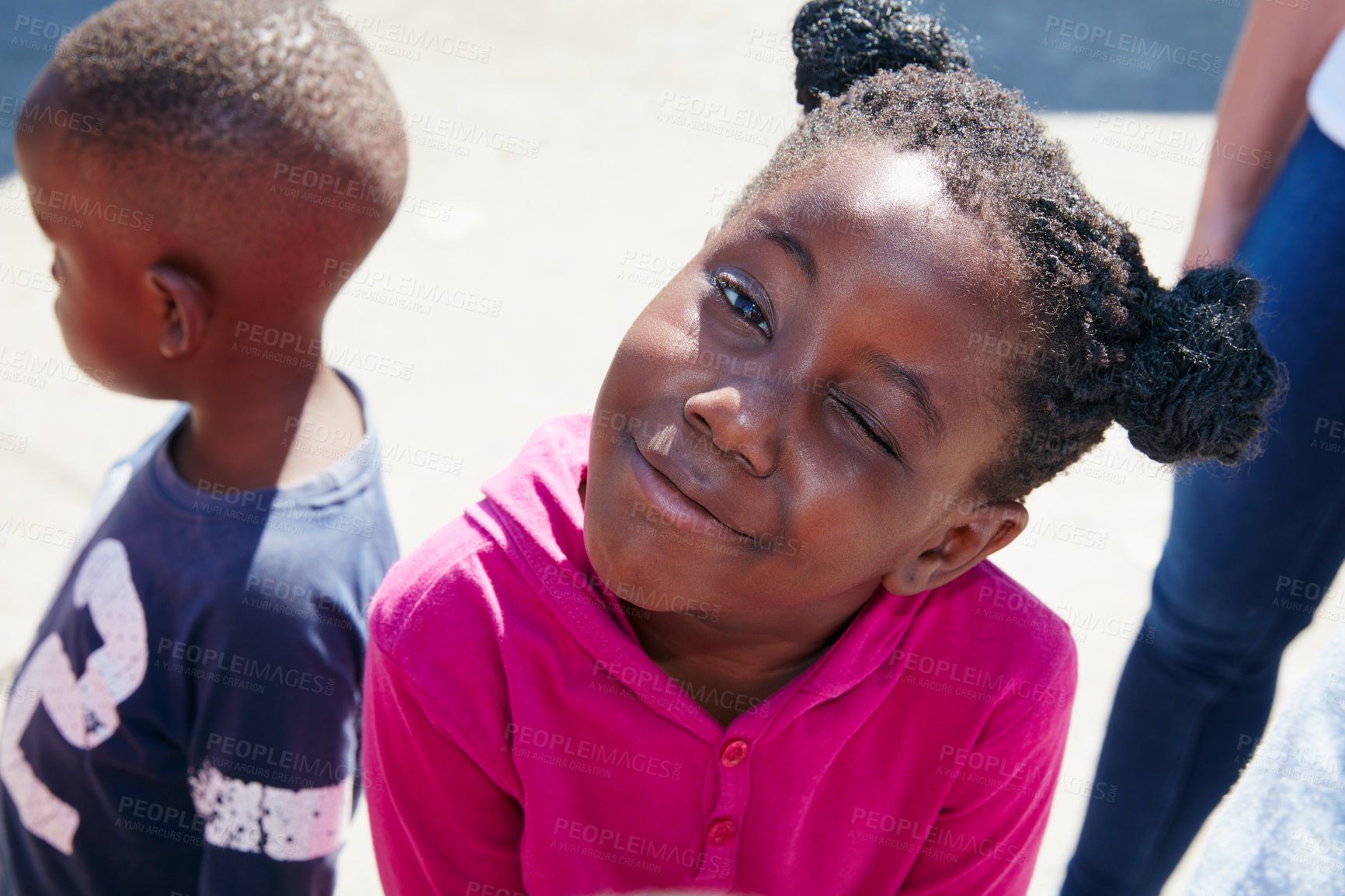 Buy stock photo Cropped portrait of a young child at a community outreach event