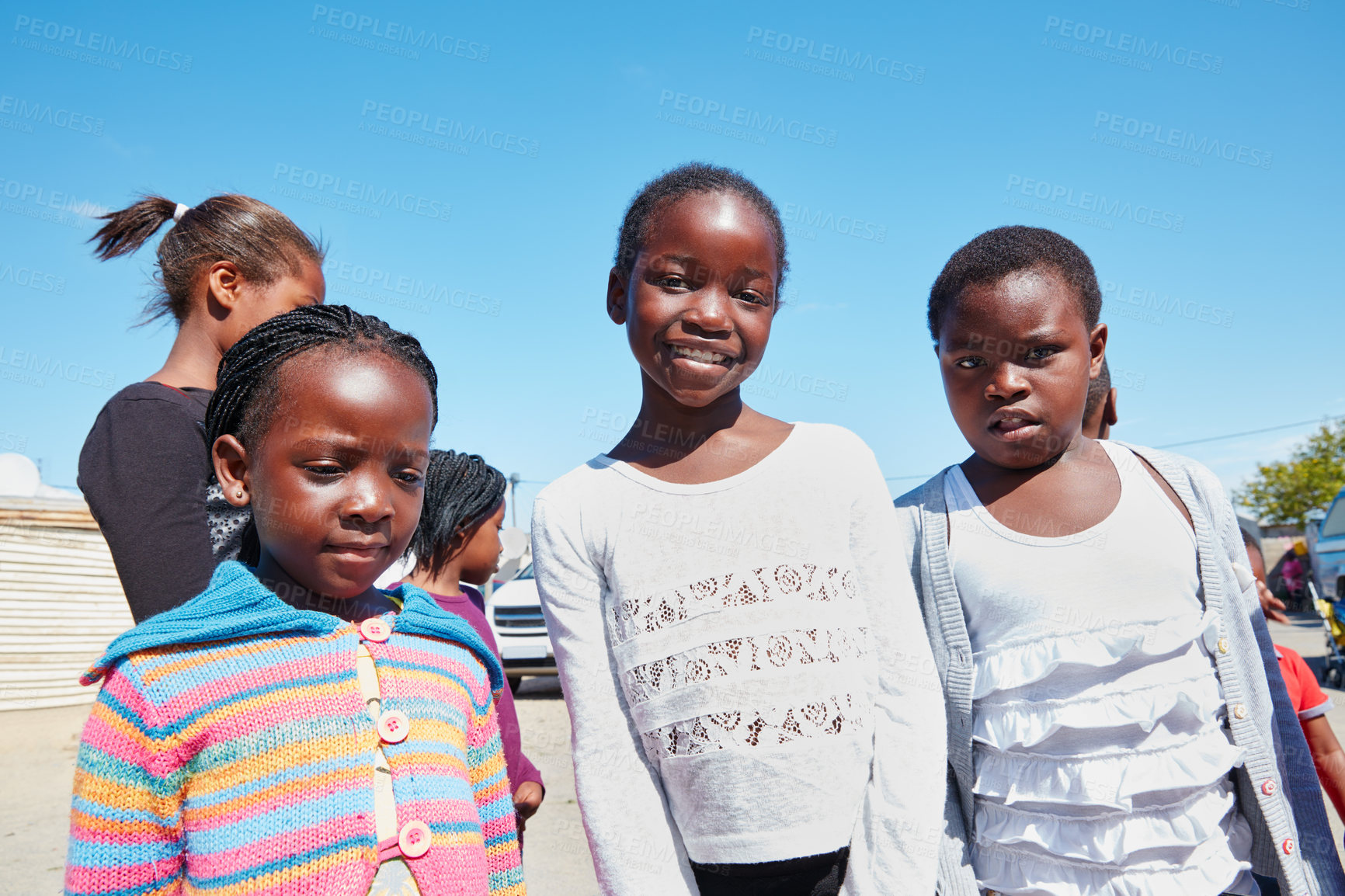 Buy stock photo Cropped portrait of a group of kids at a community outreach event