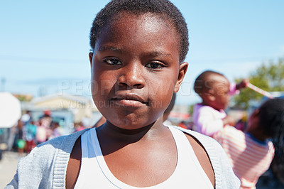 Buy stock photo Cropped portrait of a young child at a community outreach event