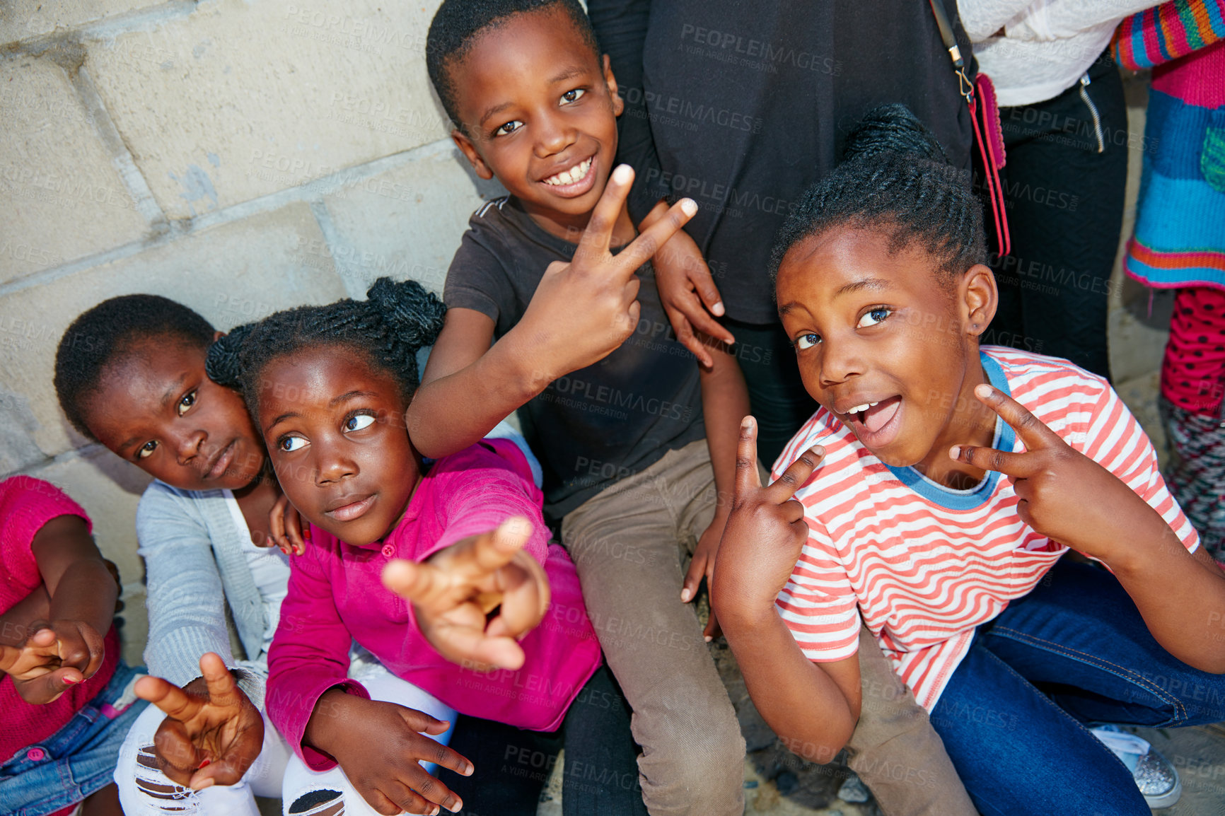 Buy stock photo Cropped portrait of a group of kids at a community outreach event