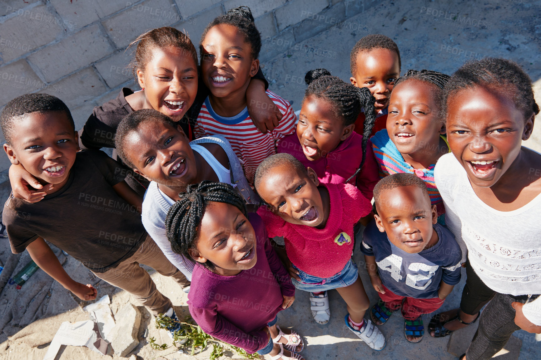 Buy stock photo Cropped portrait of a group of kids at a community outreach event