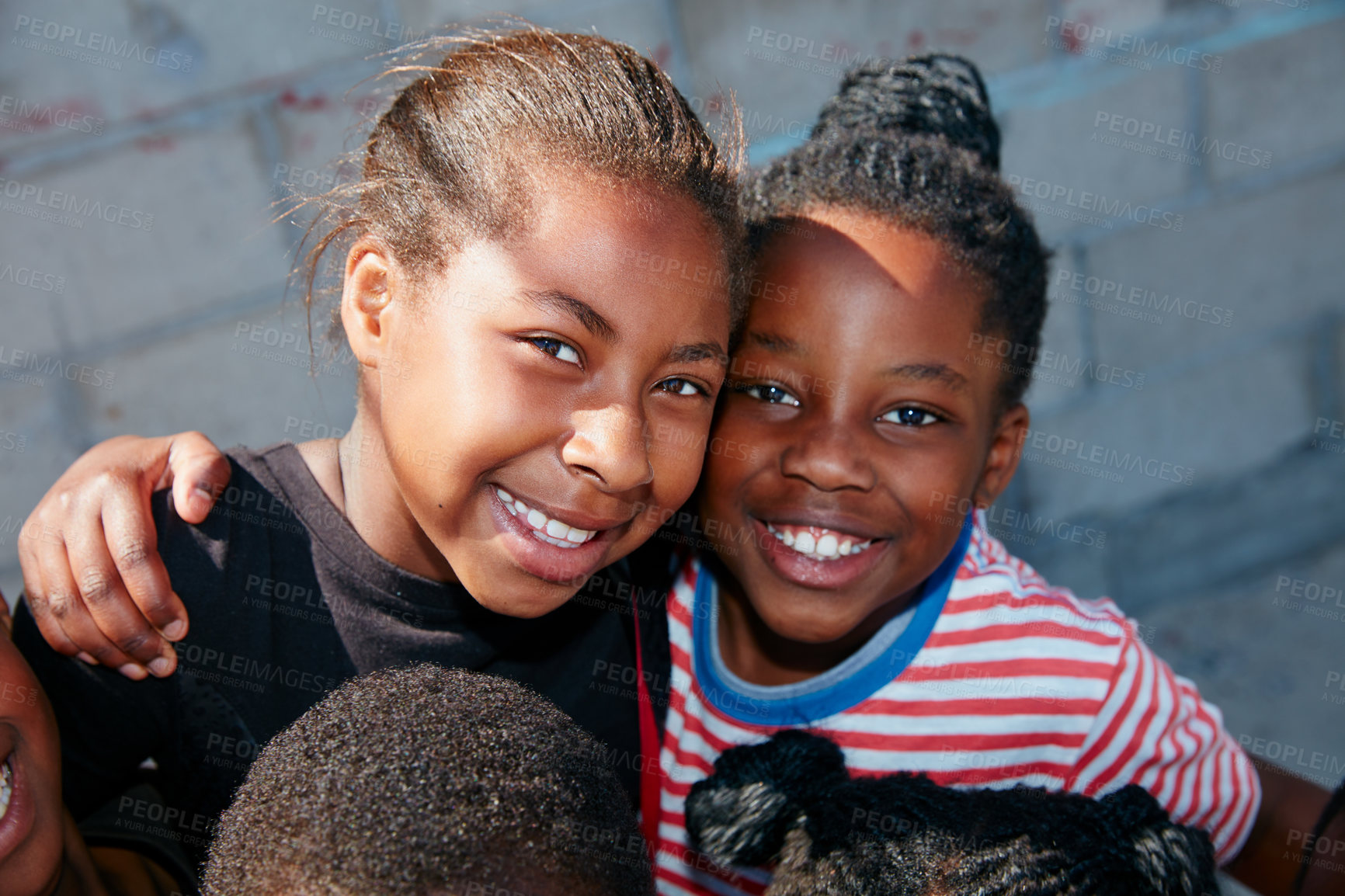 Buy stock photo Cropped portrait of a group of kids at a community outreach event