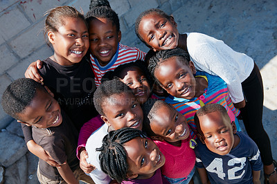 Buy stock photo Cropped portrait of a group of kids at a community outreach event