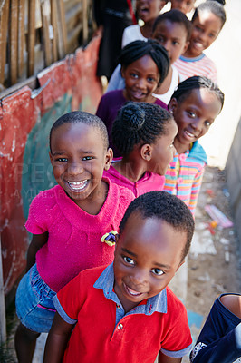 Buy stock photo Cropped portrait of a group of kids at a community outreach event