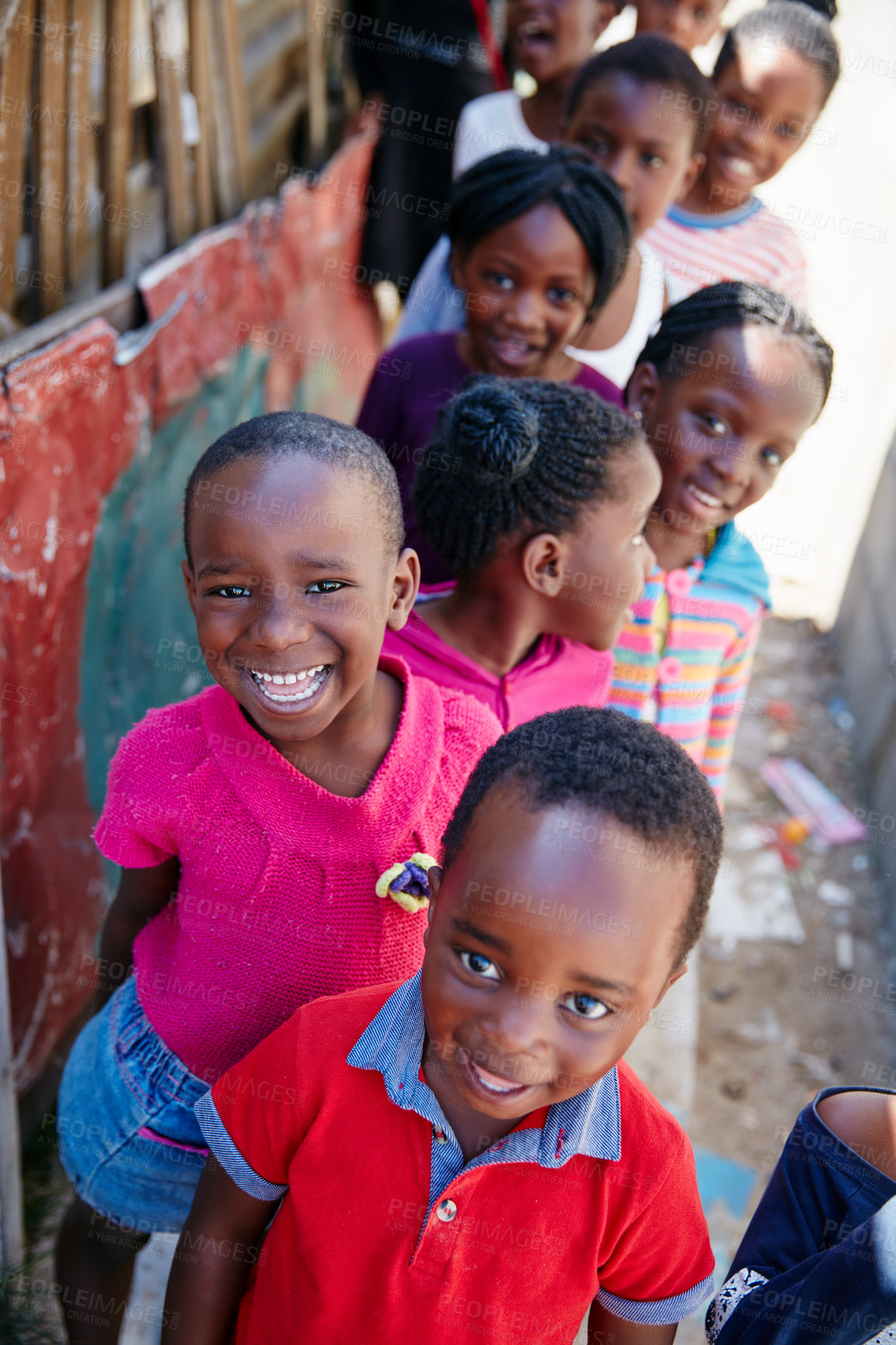 Buy stock photo Cropped portrait of a group of kids at a community outreach event