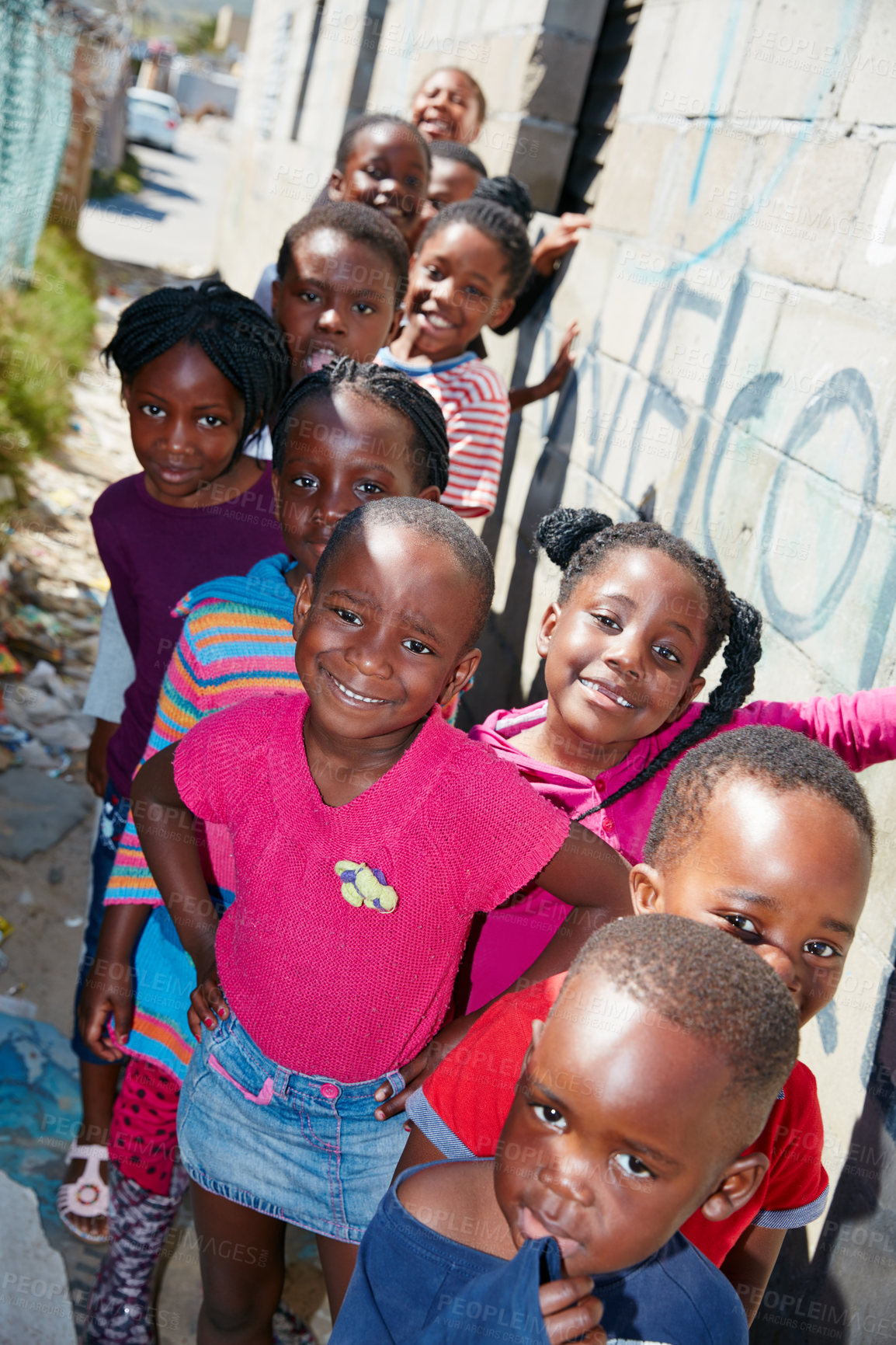 Buy stock photo Cropped portrait of a group of kids at a community outreach event