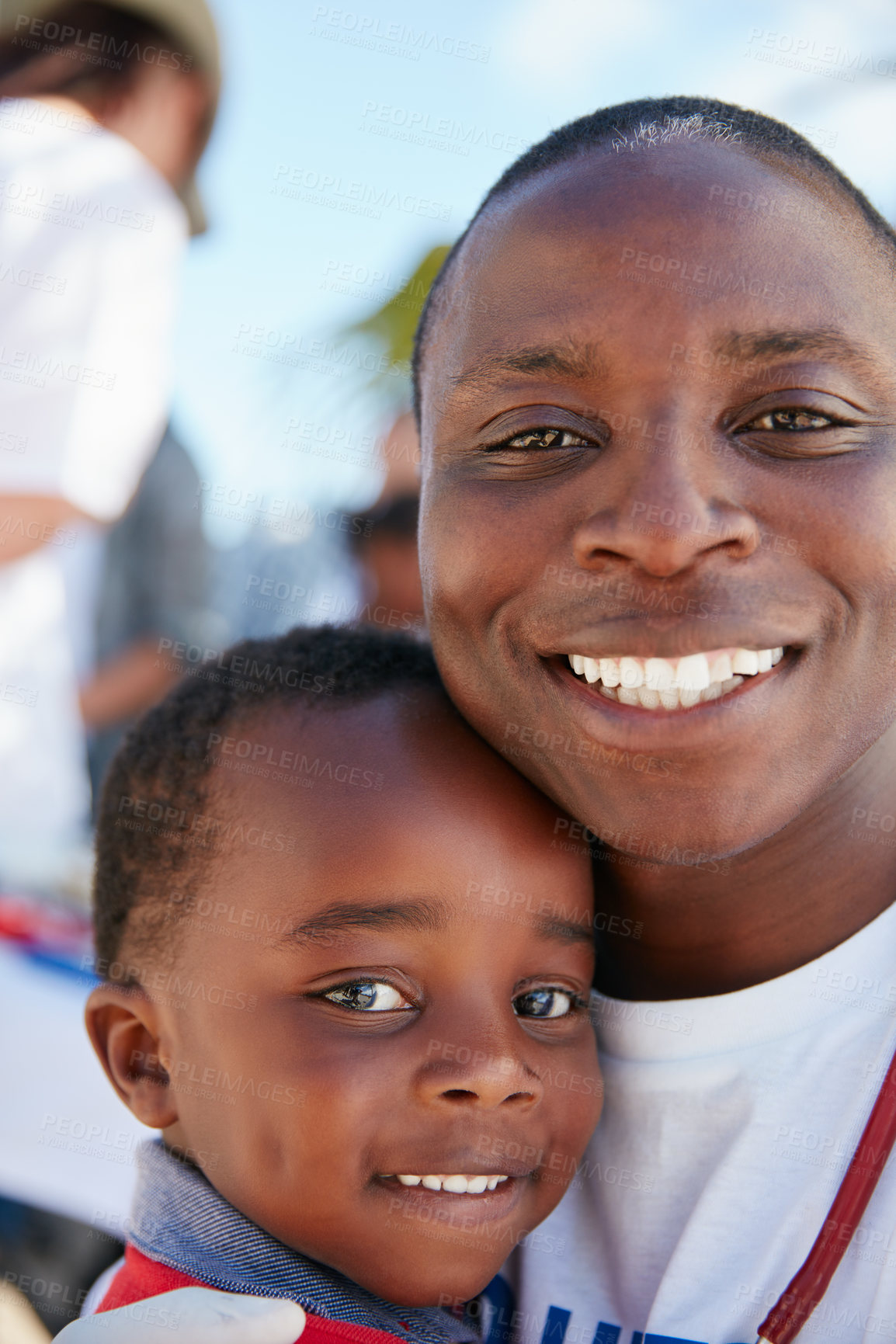 Buy stock photo Portrait of a caring volunteer doctor giving checkups to underprivileged kids