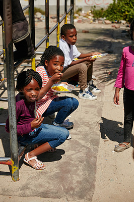 Buy stock photo Full length portrait of children getting fed at a food outreach