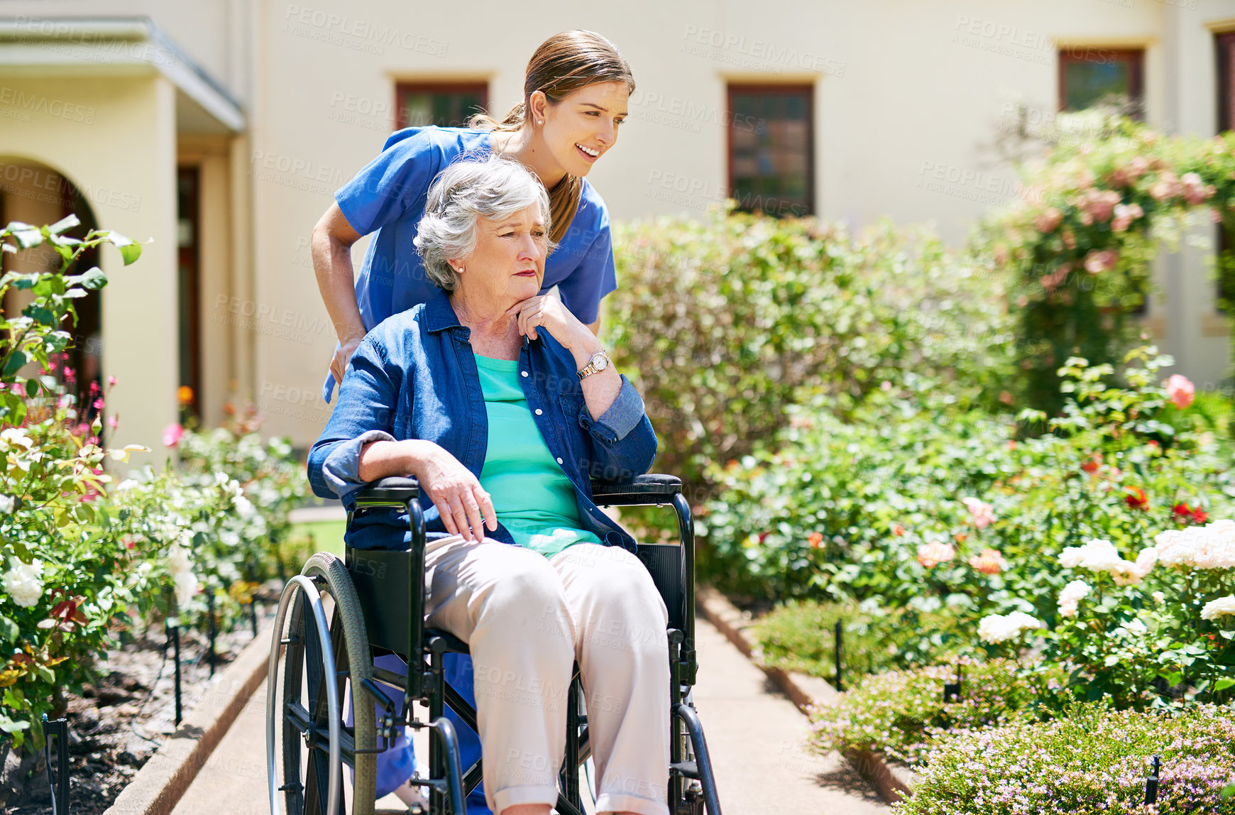 Buy stock photo Senior, woman and wheelchair with nurse at retirement home for comfort, injury rehabilitation or healthcare service. Smile, caregiver and patient with disability, consulting help and support