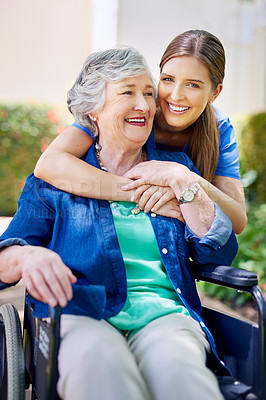 Buy stock photo Elderly, woman and wheelchair with hug in garden at retirement home for comfort, rehabilitation or healthcare service. Nurse, caregiver and patient with disability, consulting or wellness support