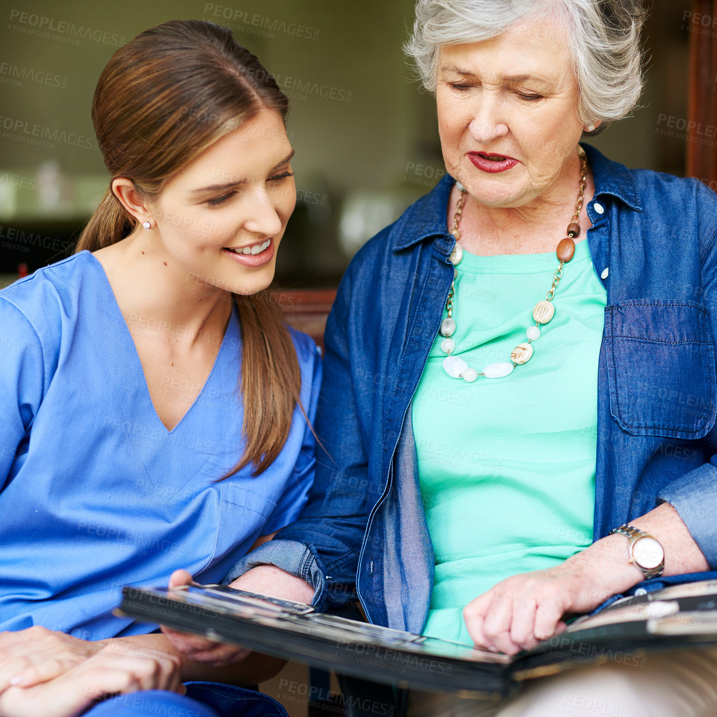 Buy stock photo People, caregiver and photo album for empathy, support and memories outside retirement home on garden bench. Nurse, elderly woman and nostalgia for mental health, therapy or healthcare wellness help