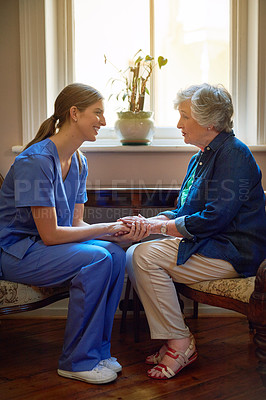 Buy stock photo Shot of a resident being consoled by a nurse in a retirement home