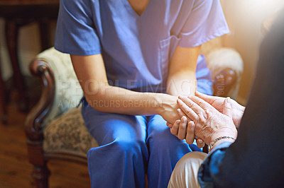 Buy stock photo Shot of a resident being consoled by a nurse in a retirement home
