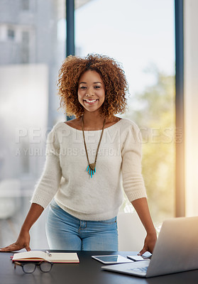 Buy stock photo Portrait of a smiling young businesswoman in her office