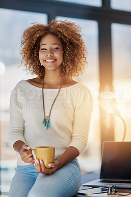 Buy stock photo Portrait of a young businesswoman drinking a coffee in her office