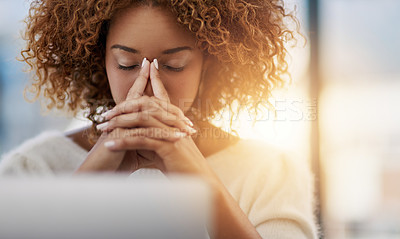Buy stock photo Shot of a young businesswoman with her eyes closed sitting in her office