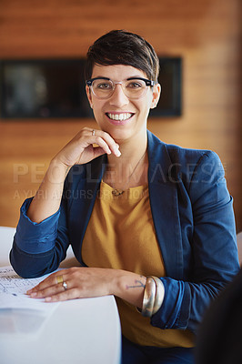 Buy stock photo Cropped portrait of a businesswoman sitting in the boardroom