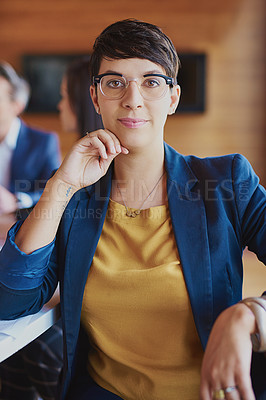 Buy stock photo Portrait of a businesswoman in a boardroom with colleagues in the background