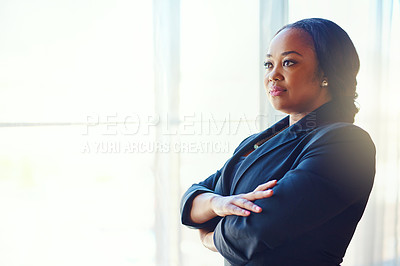 Buy stock photo Cropped shot of a confident businesswoman standing in her office