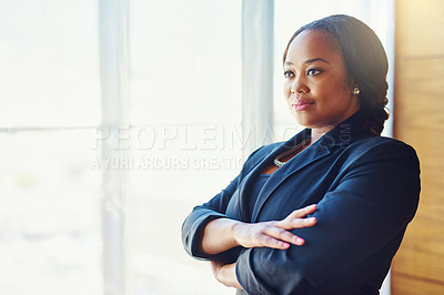 Buy stock photo Cropped shot of a confident businesswoman standing in her office