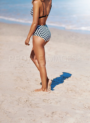 Buy stock photo Cropped shot of a young woman in her bikini