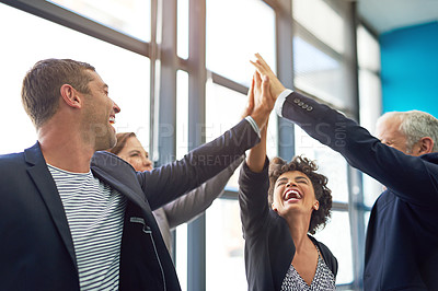 Buy stock photo Business people, group high five and happy in office with teamwork, smile and support for company goals. Men, women and hands in air for team building, achievement and celebration at insurance agency