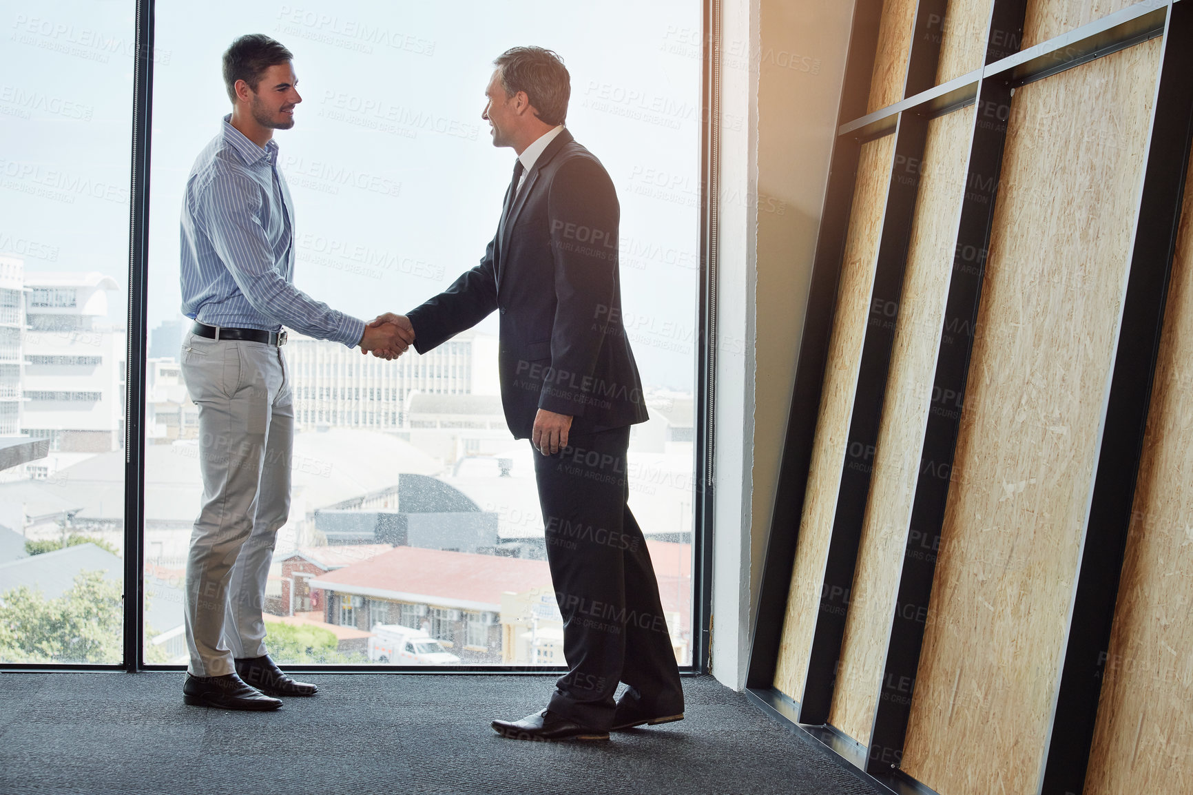 Buy stock photo Shot of a group of businesspeople in a meeting