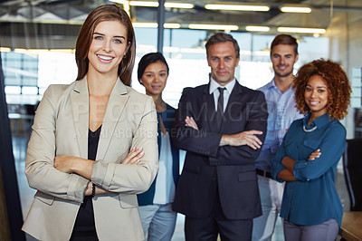 Buy stock photo Portrait of a team of professionals standing together in an office