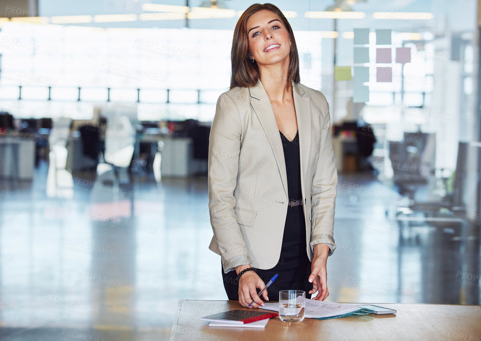 Buy stock photo Portrait of a successful businesswoman working in an office