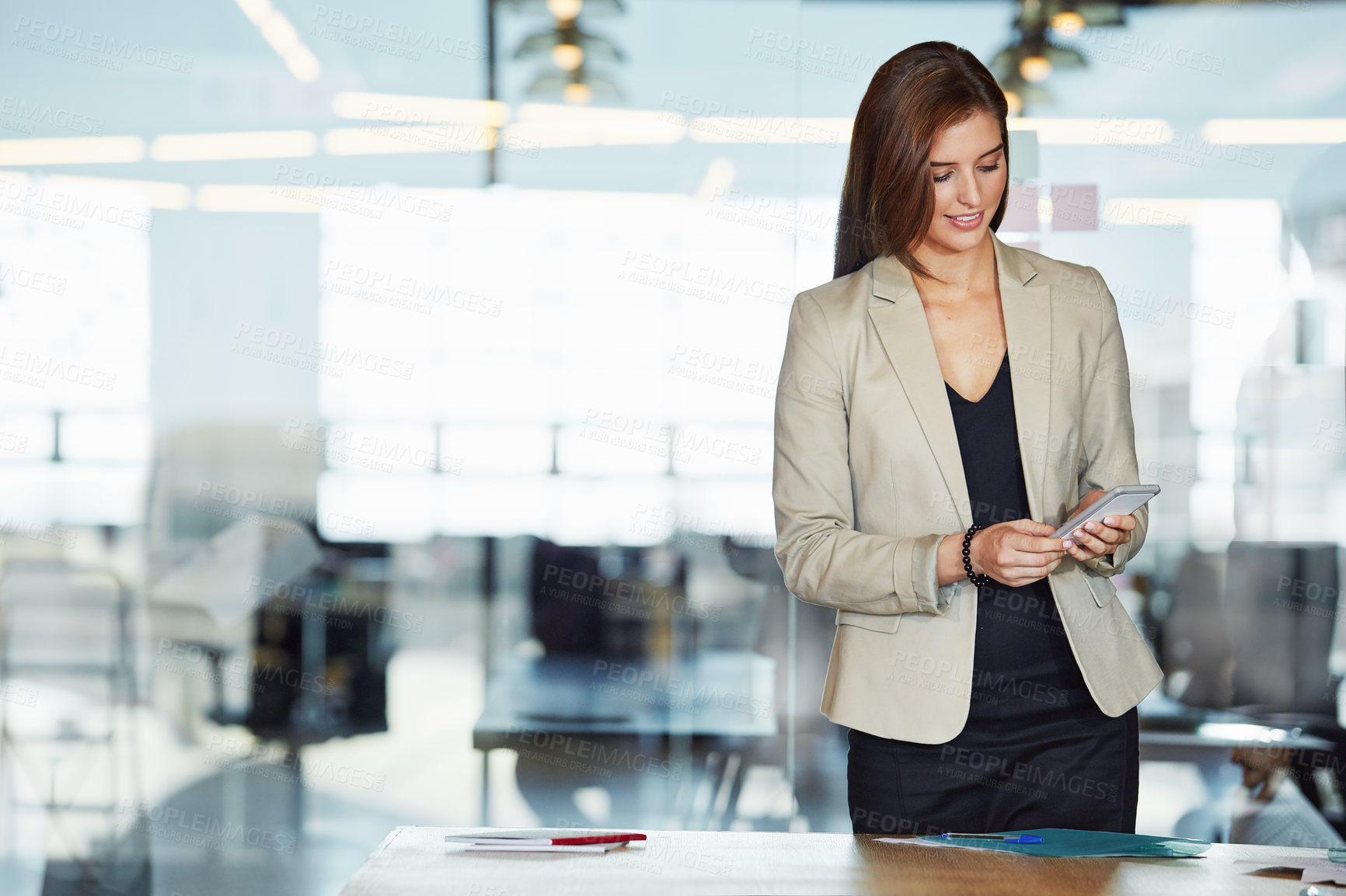 Buy stock photo Office, phone and business woman typing, texting or social media. Cellphone, break and happy female employee with mobile smartphone for research, networking or internet browsing in company workplace.