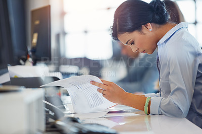 Buy stock photo Cropped shot of a young businesswoman working in the office