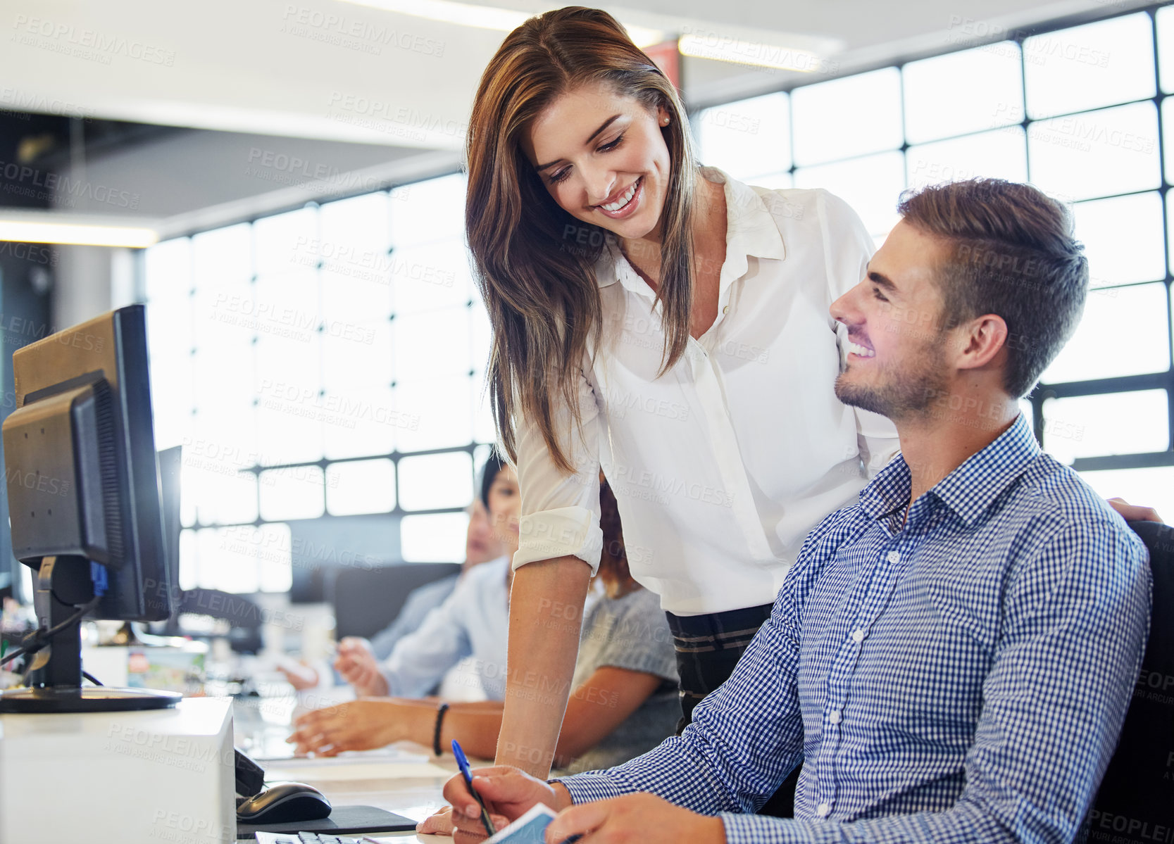 Buy stock photo Cropped shot of a group of businesspeople working in the office