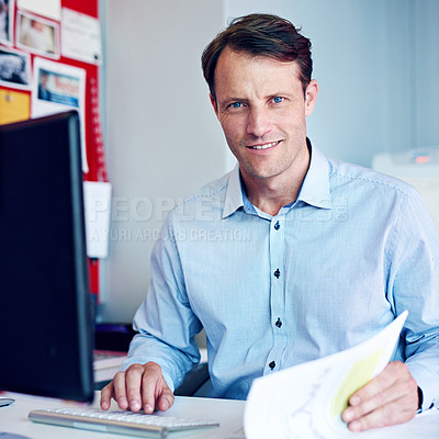 Buy stock photo Portrait of a businessman working at his desk