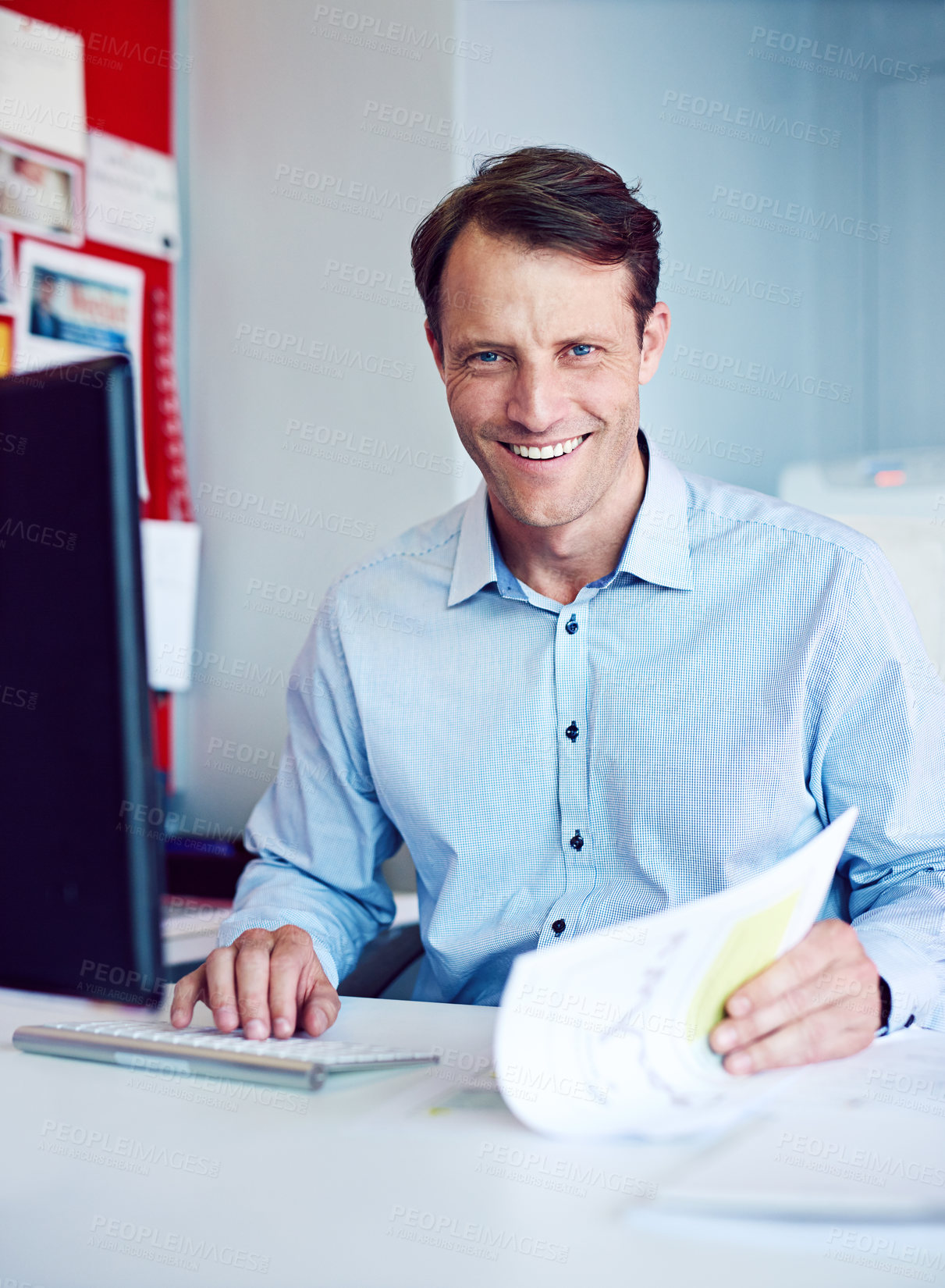 Buy stock photo Portrait of a businessman working at his desk