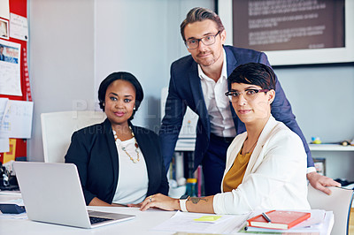 Buy stock photo Cropped portrait of three business colleagues working in the office