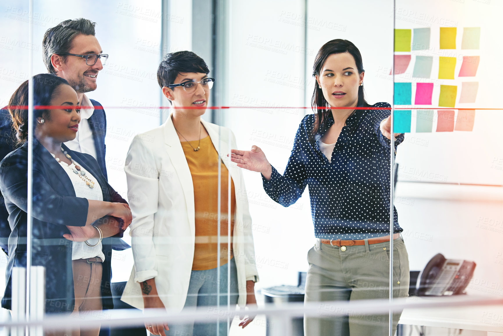 Buy stock photo Business people, presentation and glass wall for teamwork, brainstorming and collaboration in office. Group, meeting and planning for development, workshop and discussion as colleagues with diversity