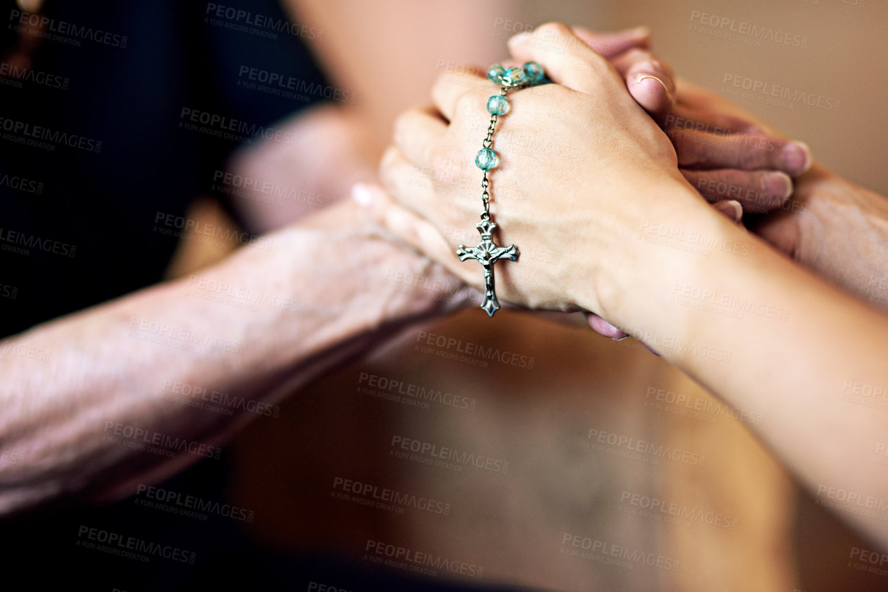 Buy stock photo Senior, rosary or people holding hands for praying, support or comfort for care, trust or worship. Closeup, faith or mourning with Christian widow for help, grief or peace for loss or healing in home