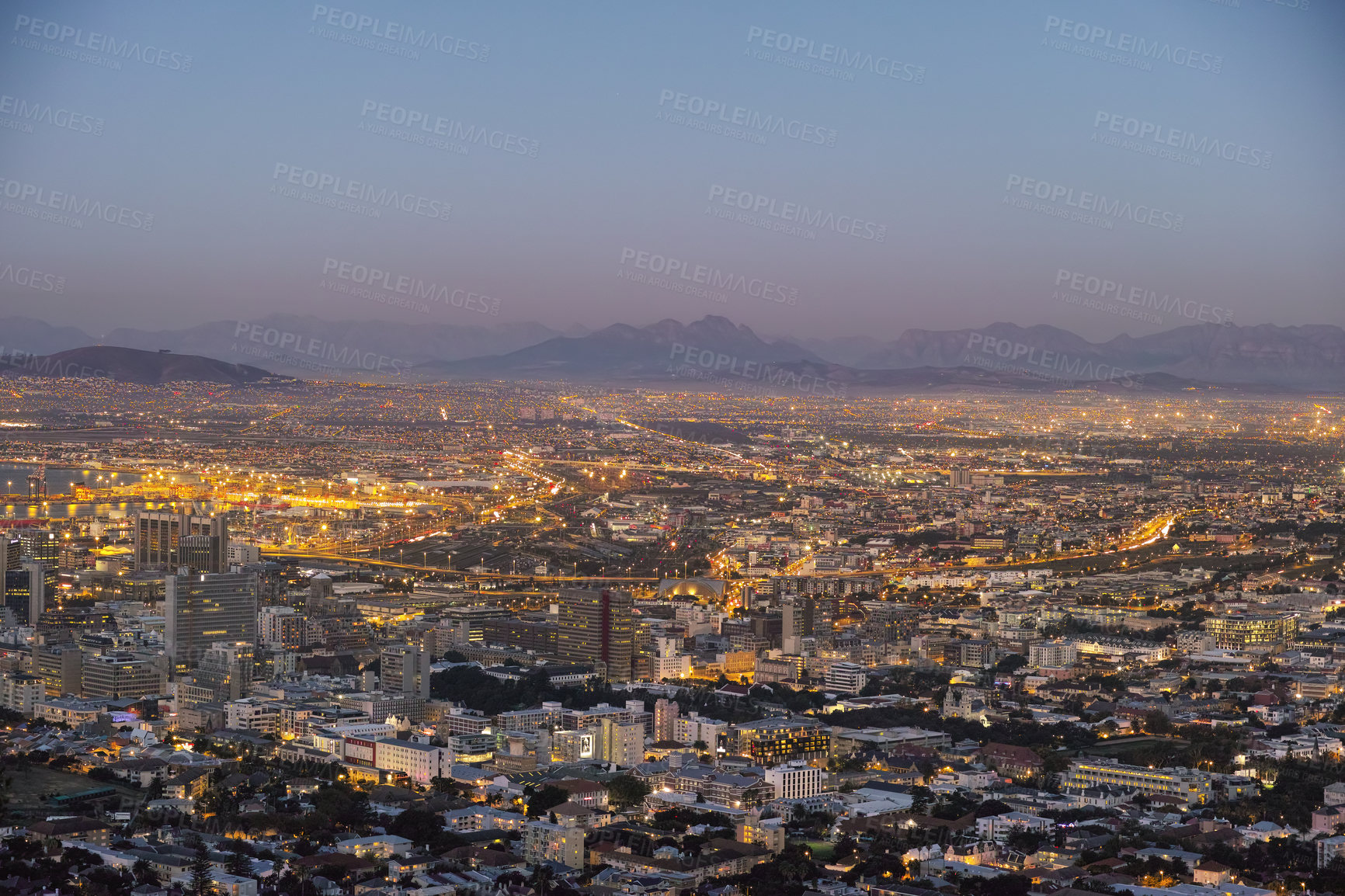 Buy stock photo Night, cityscape and urban buildings, architecture or infrastructure for development, expansion and property. Skyline, cbd and mountains with city skyscraper, commercial road or space in Cape Town