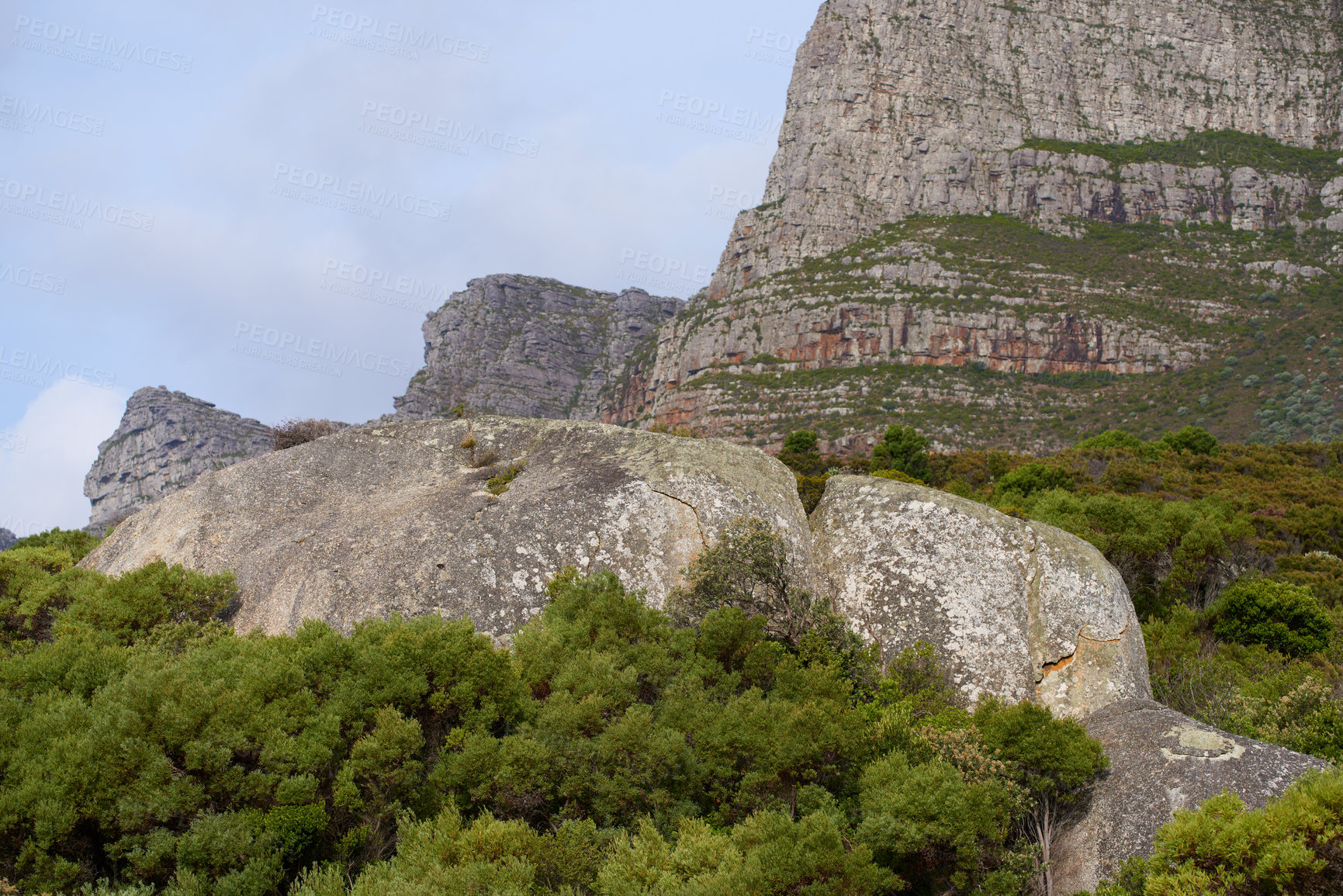 Buy stock photo Landscape view of Lions Head in Cape Town, South Africa during a day. Beautiful mountains against a cloudy sky. Travelling and exploring mother nature through hiking adventures in summer