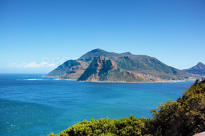 Buy stock photo A mountain in Hout Bay, South Africa on a summer day with blue sky copyspace. Panaramona view of a mountain peak, popular tourist attraction with hiking rails for travellers on  adventurous vacation 