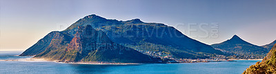 Buy stock photo Panorama seascape, landscape, scenic view of mountains in Hout Bay in Cape Town, South Africa. Blue ocean and sea with hills. Travel and tourism abroad and overseas for a summer holiday and vacation