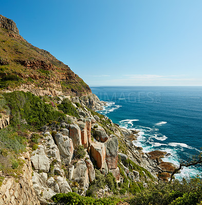 Buy stock photo Seascape, landscape and scenic view of Hout Bay in Cape Town, South Africa. Blue ocean and sea with mountains and copyspace. Travel and tourism abroad and overseas for a summer holiday and vacation